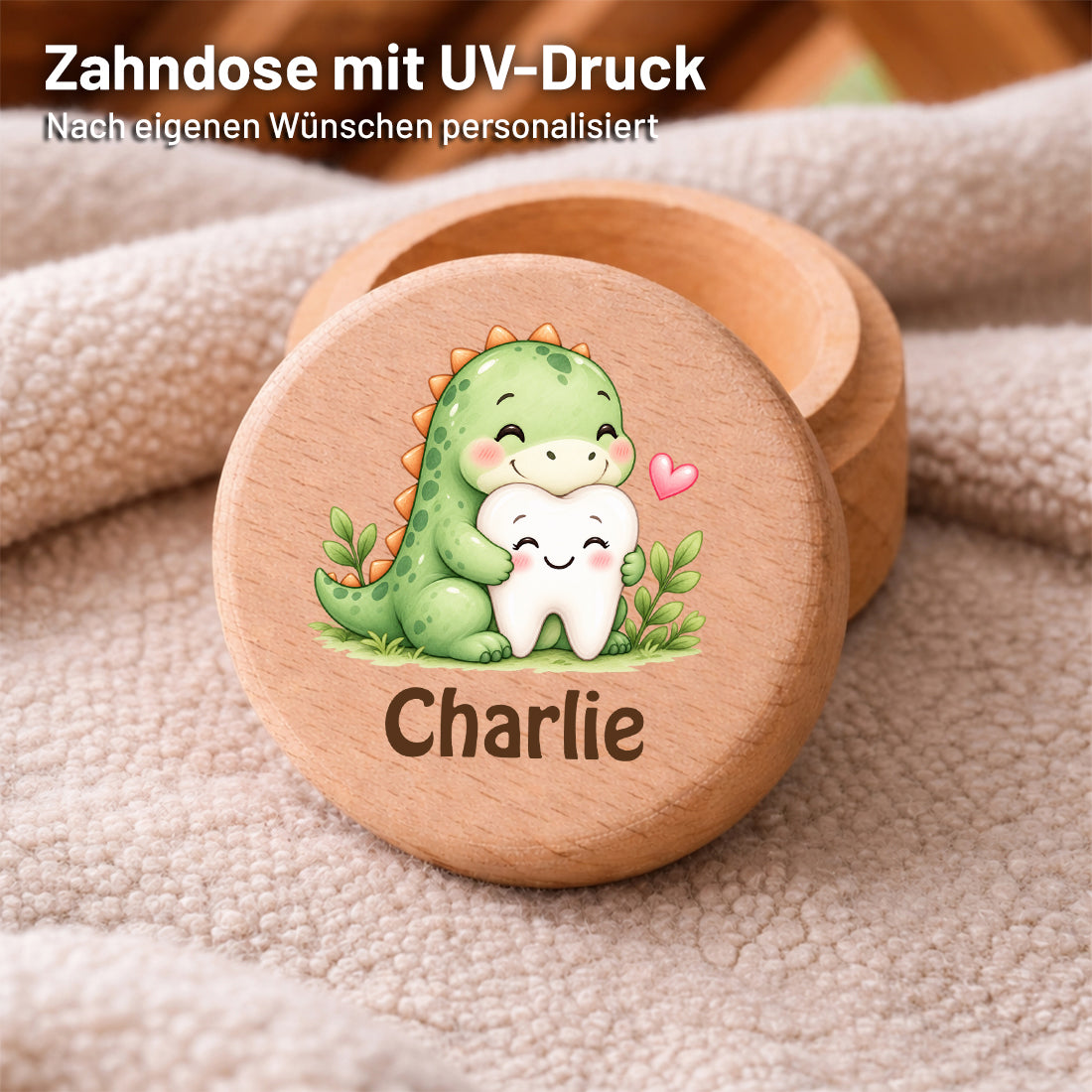 Runde Zahndose mit Motiv Dino & Zahn und Beispielname Charlie im Detailbild mit UV-Druck auf dem Deckel