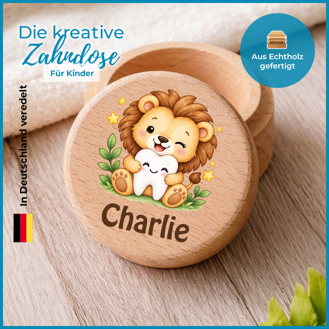 Runde Zahndose mit Motiv Löwe & Zahn und Beispielname Charlie im Detailbild mit Holzmaserung