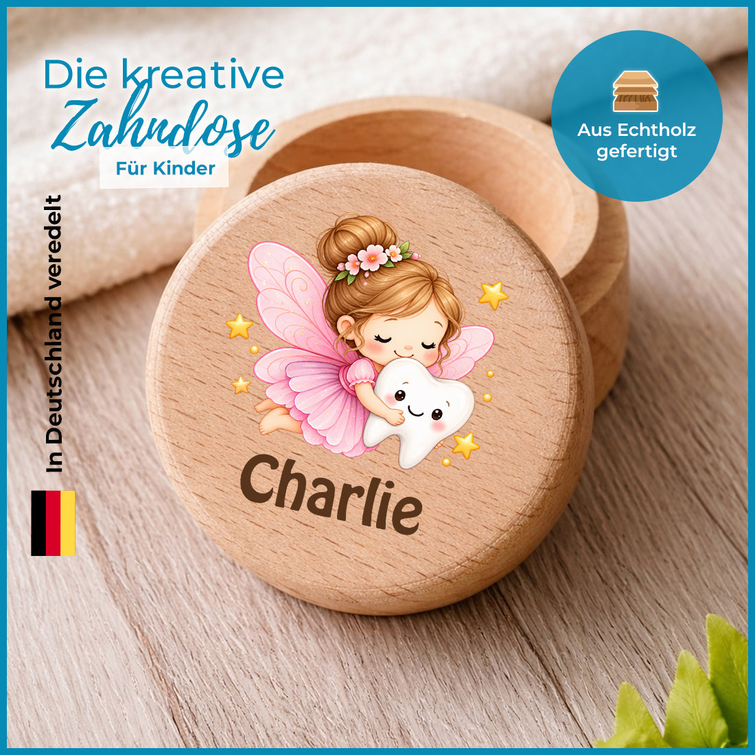 Runde Zahndose mit Motiv Zahnfee und Beispielname Charlie im Detailbild mit Holzmaserung