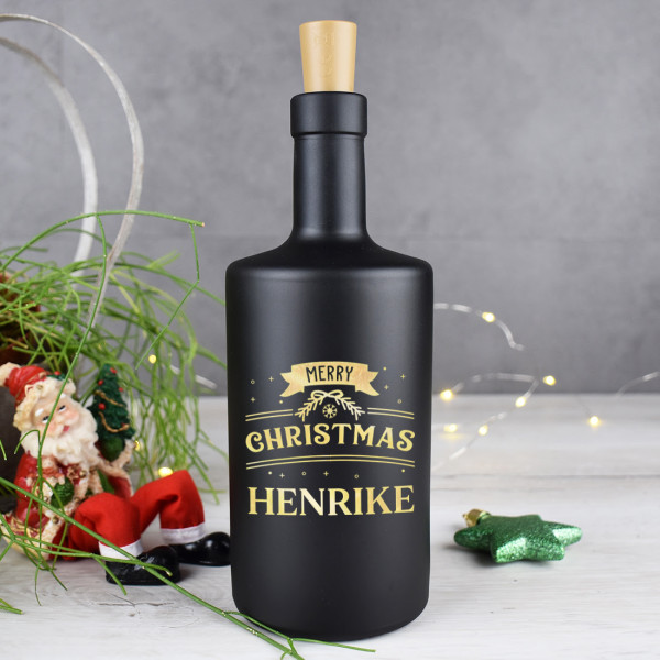 Glasflasche beleuchtet mit personalisierter Wunschgravur passend zu Weihnachten